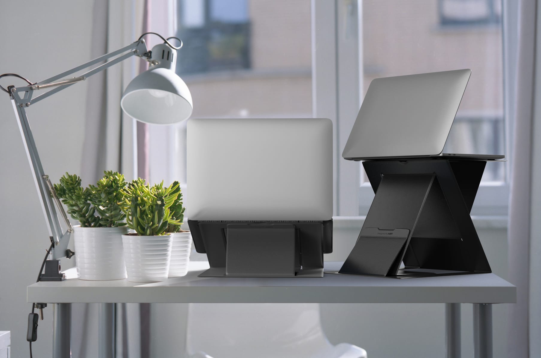 MOFT Z: The 4-in-1 invisible sit-stand laptop desk