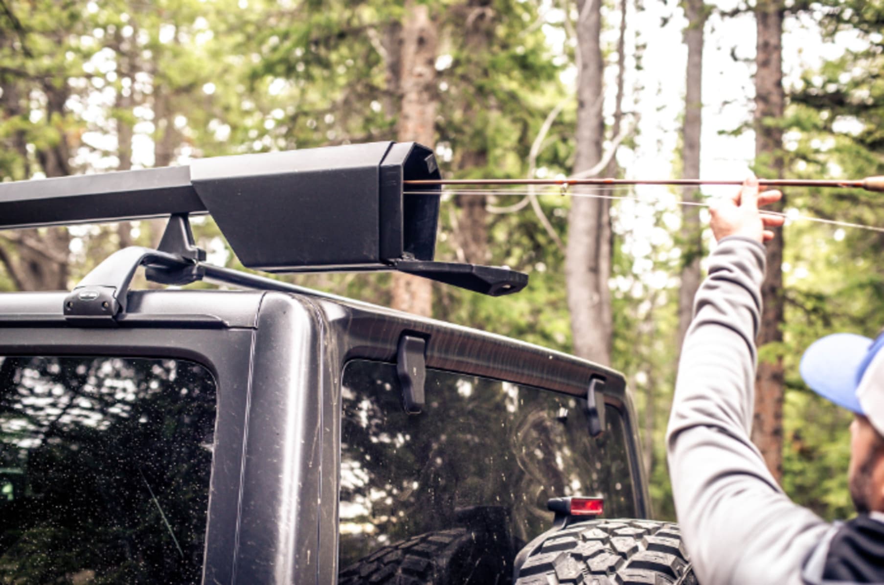 Fishing pole holder clearance for roof rack